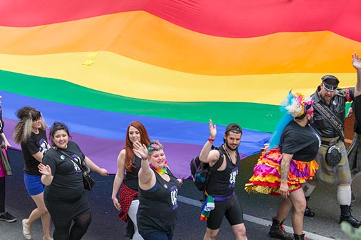 Seattle Pride parade People walking in Pride parade
