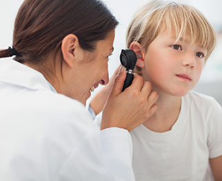 doctor examining child doctor examining child