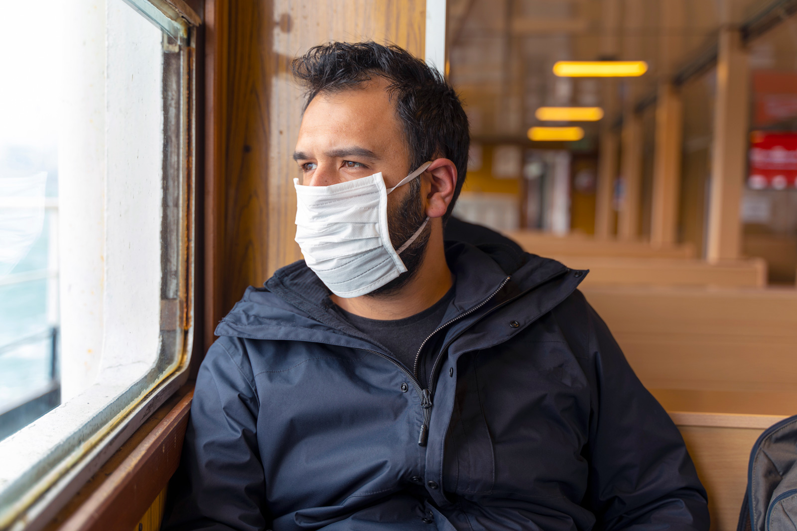 man alone with face mask